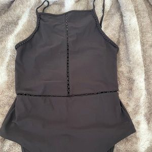 Black body suit with see through middle/around the waist